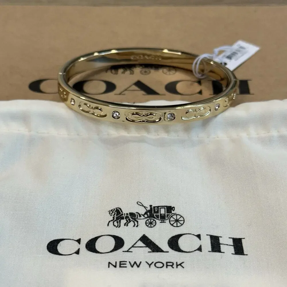 Coach “Kissing C” Signature Hinged Bangle Bracelet Jewelry Gold Rhinestone NWT